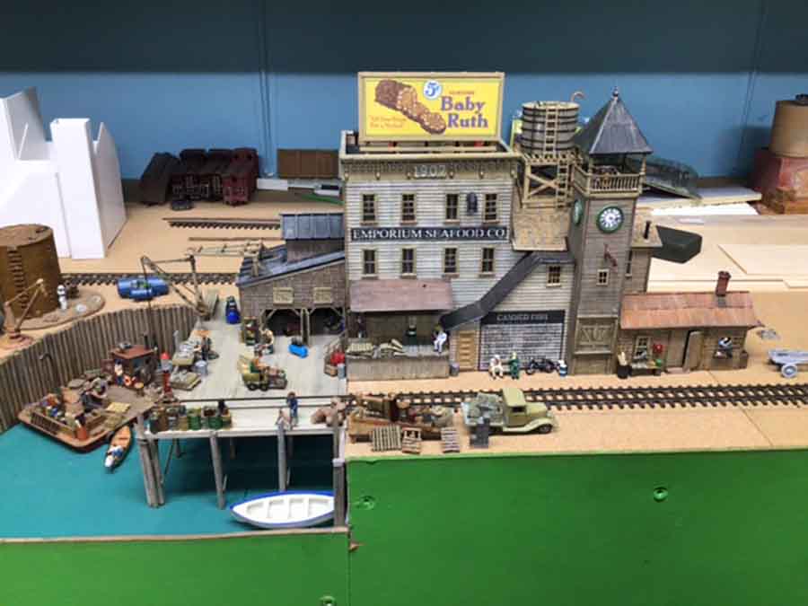 model railroad track around harbor